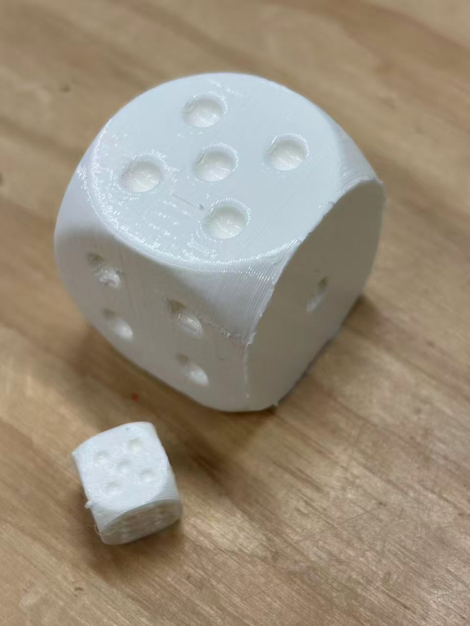 This is a dice. <div class='container'><iframe class='responsive-iframe' src='https://hudak.phoenix.sheridanc.on.ca/P1Stuff/Index.html'></iframe></div>